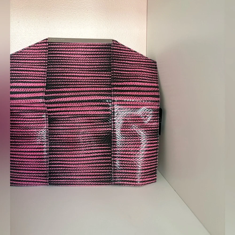 BCBGMaxazria Pink & Black Striped Clutch inside pockets with zipper. Very soft